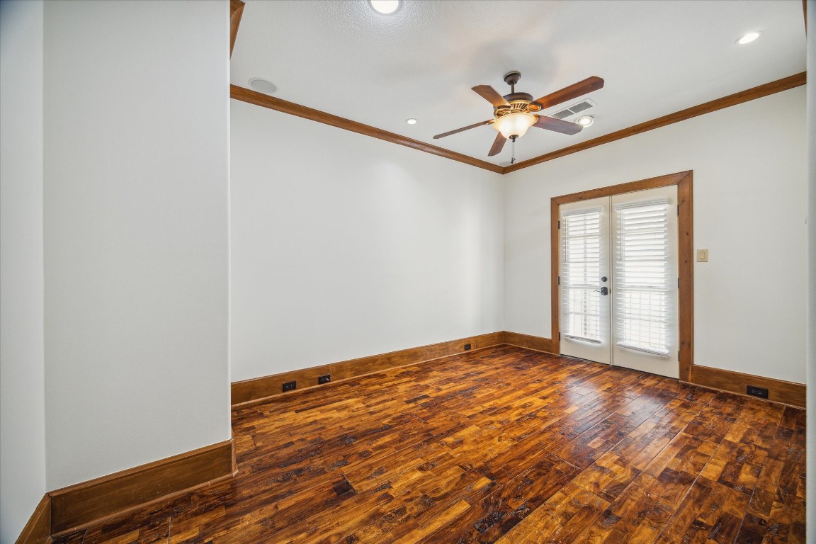 3614 Lancashire Street Houston, TX 77027 - Photo 26 of 47 a view of room with ceiling fan and wooden floor