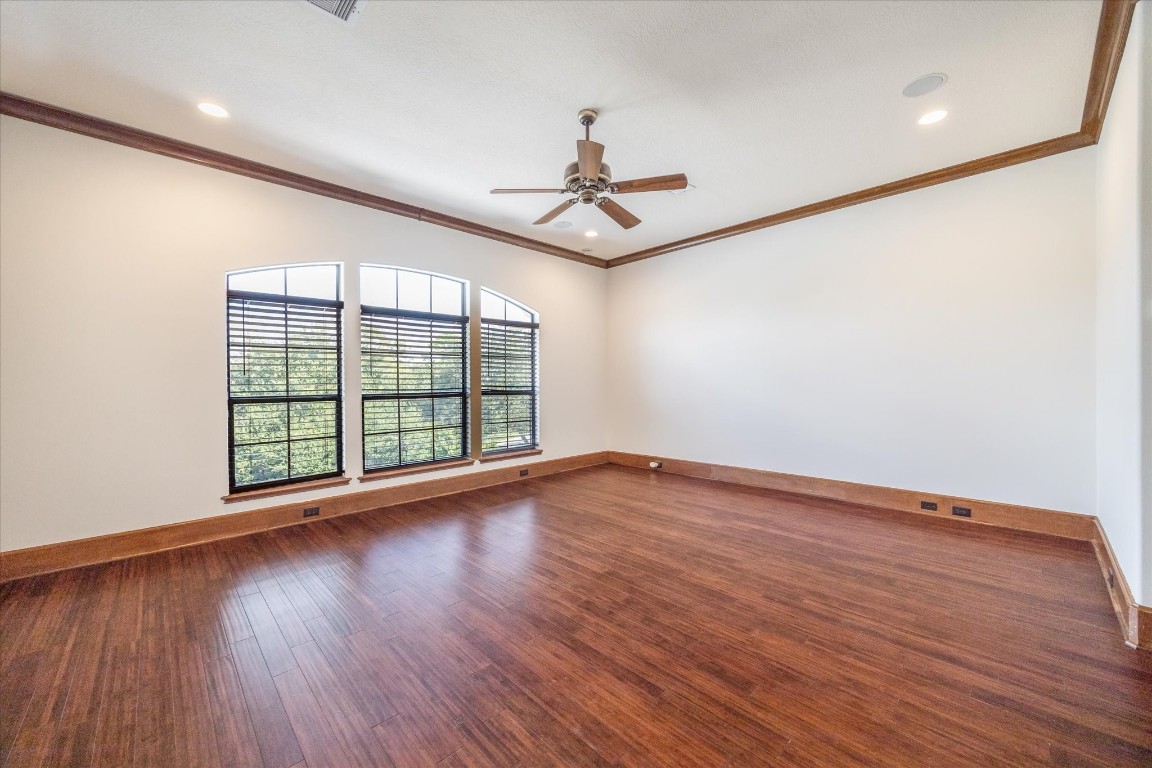 3614 Lancashire Street Houston, TX 77027 - Photo 28 of 47 a view of room with wooden floor fan and windows