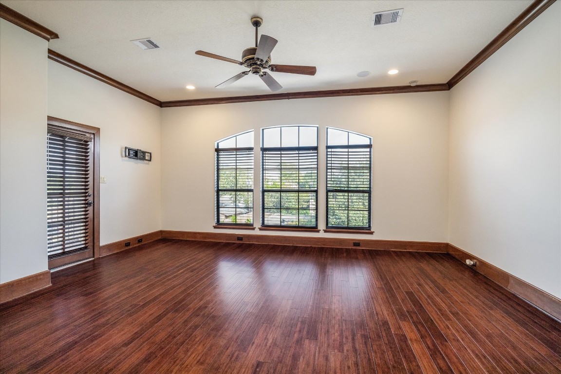 3614 Lancashire Street Houston, TX 77027 - Photo 29 of 47 a view of an empty room with wooden floor and a window