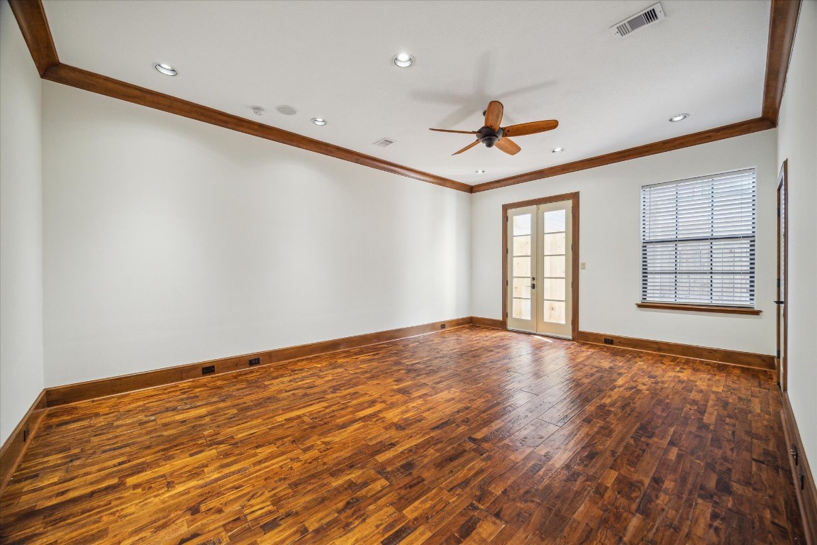 3614 Lancashire Street Houston, TX 77027 - Photo 8 of 47 wooden floor in an empty room with a window