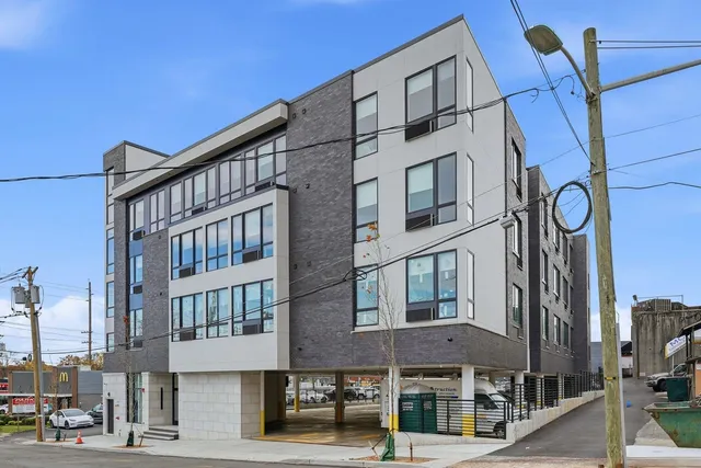 a front view of a building with street view