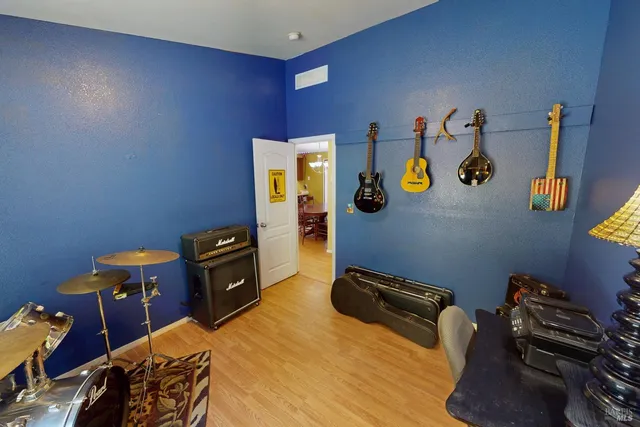 a room with furniture and a wooden floor