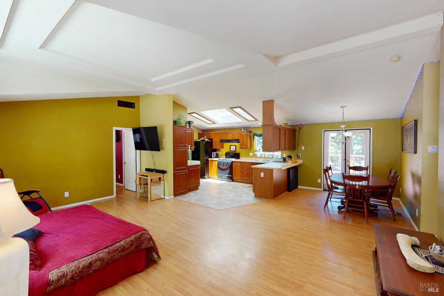 28001 Tenmile Road Gualala, CA 95445 - Photo 5 of 32 a bedroom with furniture and a large window