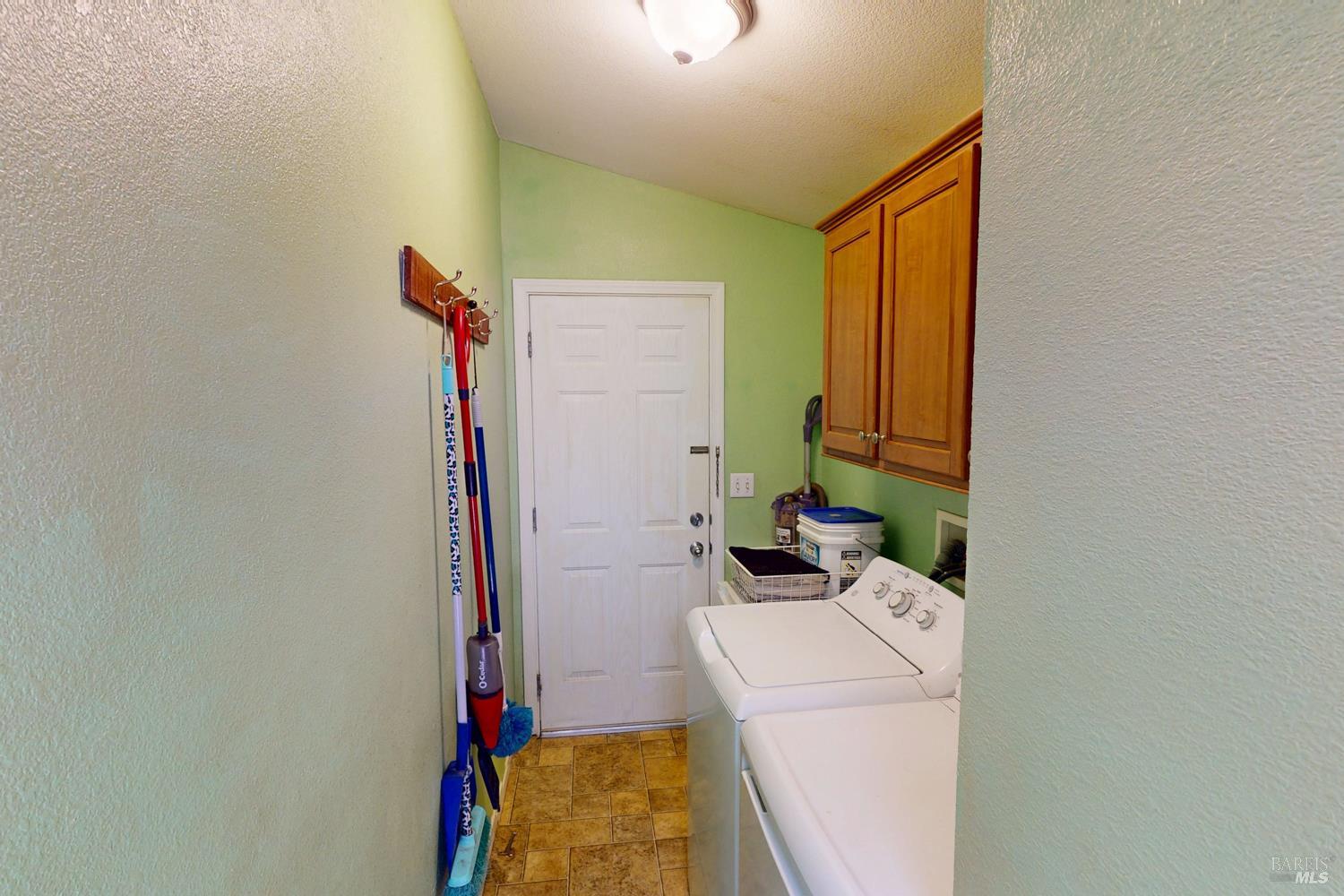 28001 Tenmile Road Gualala, CA 95445 - Photo 7 of 32 a bathroom with a sink a toilet and shower