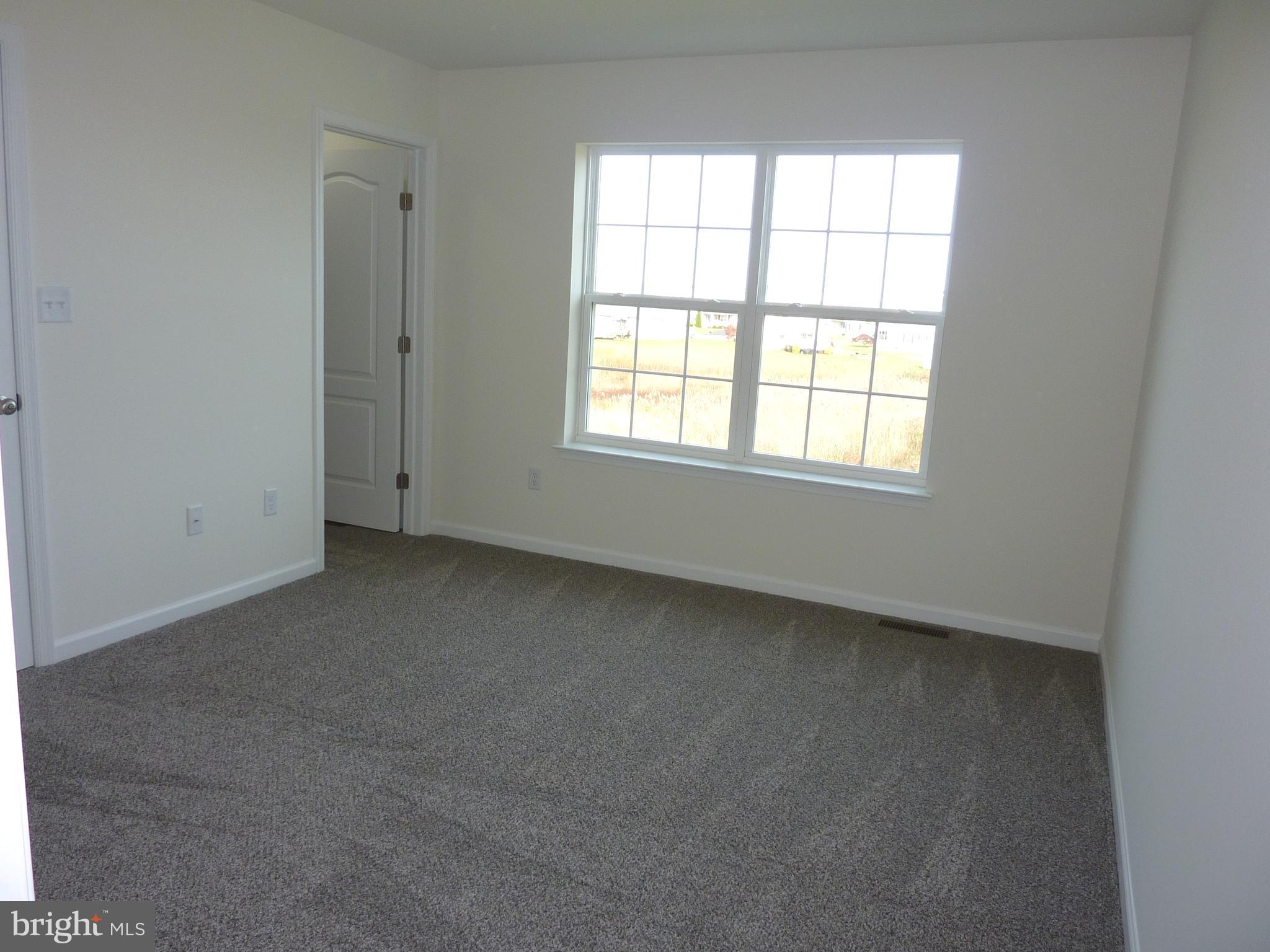 272 Doylestown Road Smyrna, DE 19977 - Photo 16 of 34 an empty room with a window