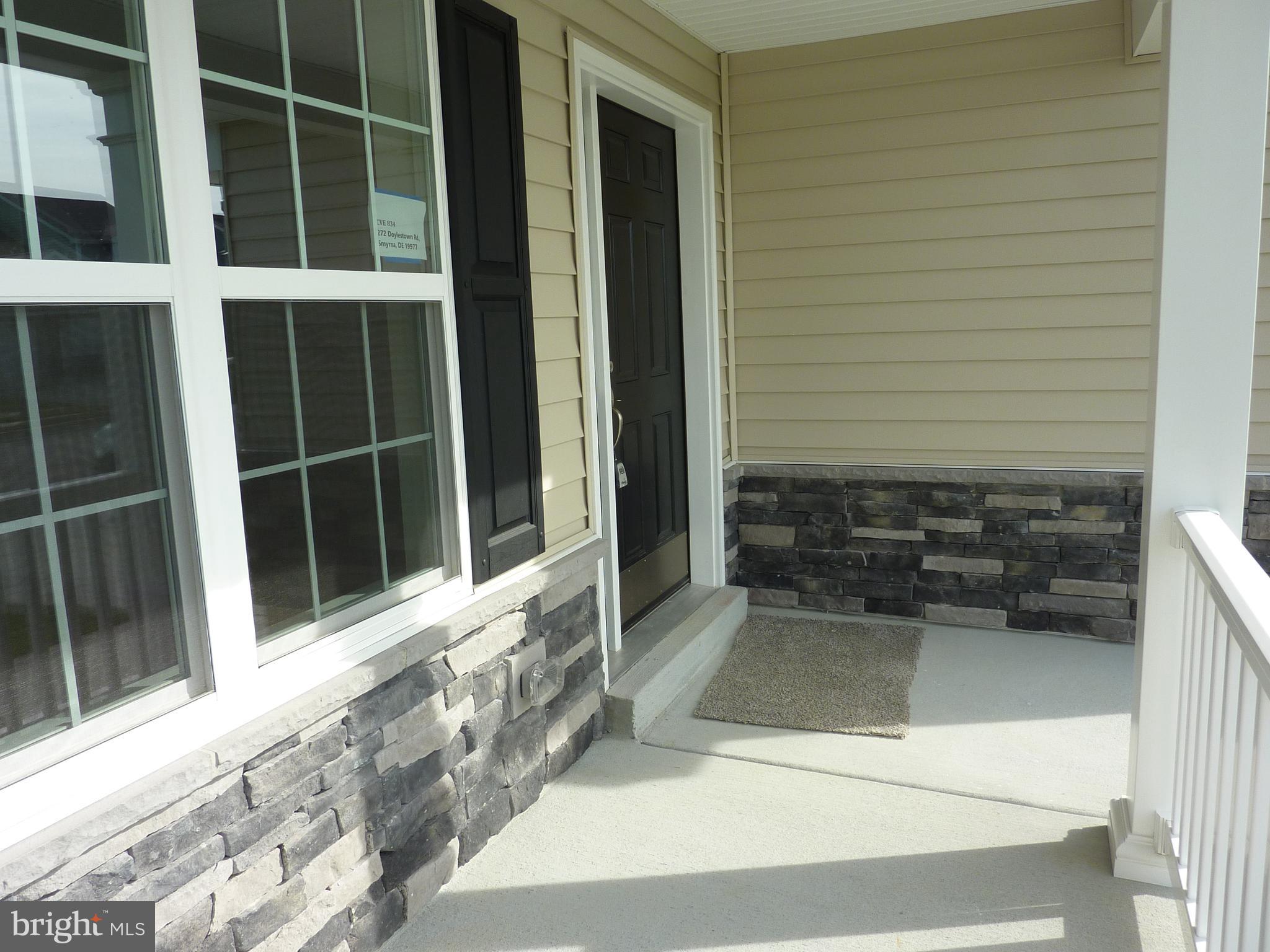 272 Doylestown Road Smyrna, DE 19977 - Photo 3 of 34 a view of a porch of a house