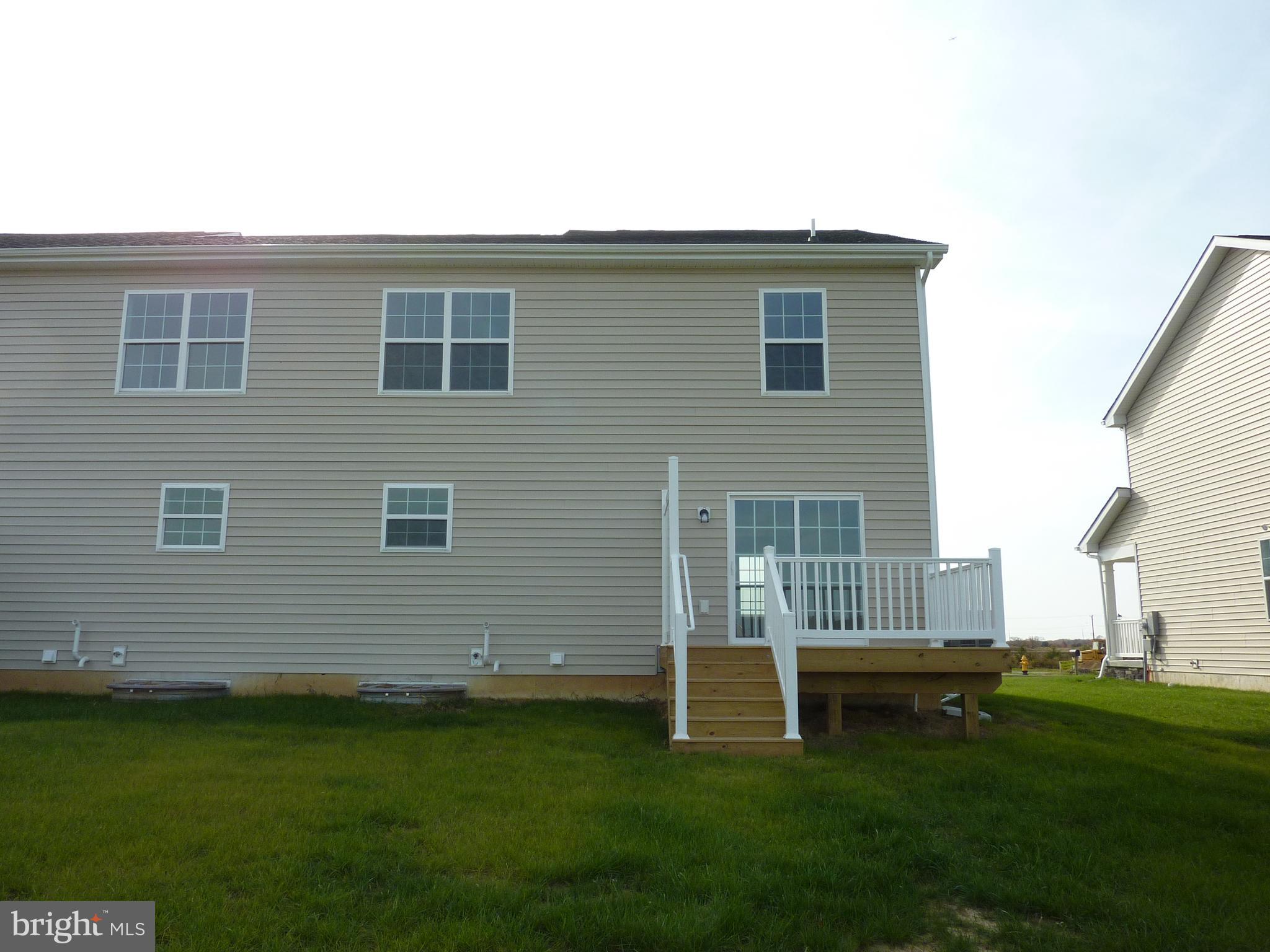 272 Doylestown Road Smyrna, DE 19977 - Photo 33 of 34 a view of a house with a backyard