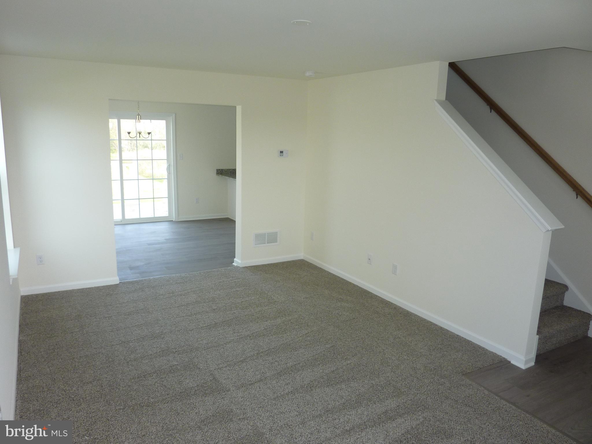 272 Doylestown Road Smyrna, DE 19977 - Photo 6 of 34 a view of an empty room with window