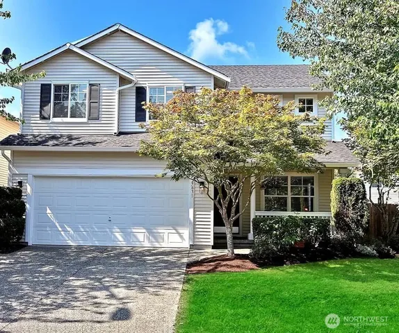 a front view of house with yard