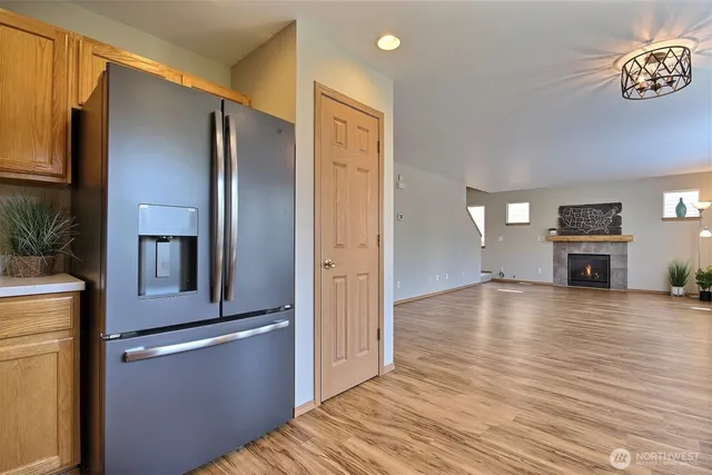 a view of a kitchen from the hallway