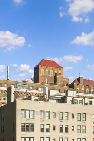 a view of a large building with a view of a city