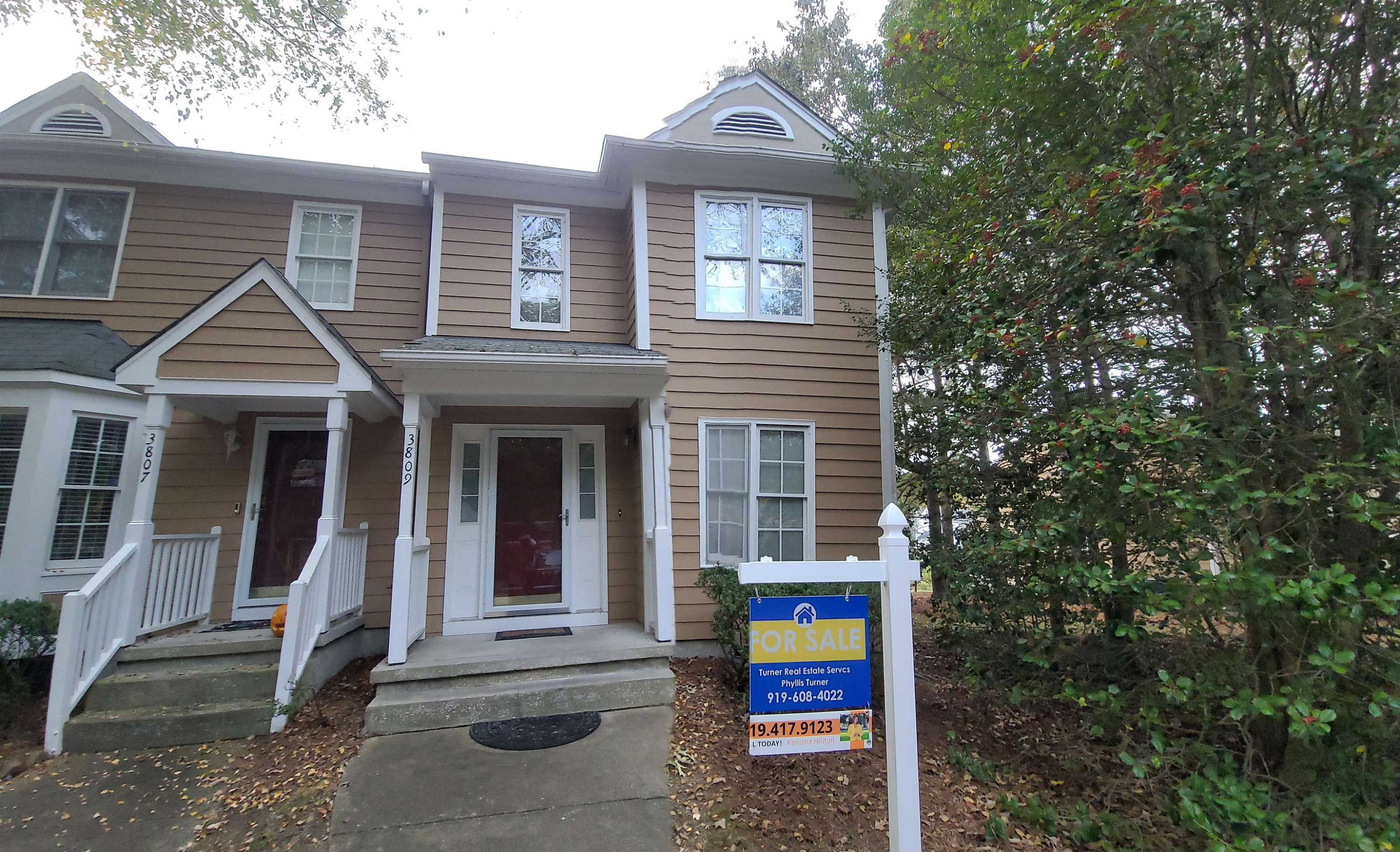 3809 Axle Lane Raleigh, NC 27616 - Photo 1 of 30 a front view of a house with a tree