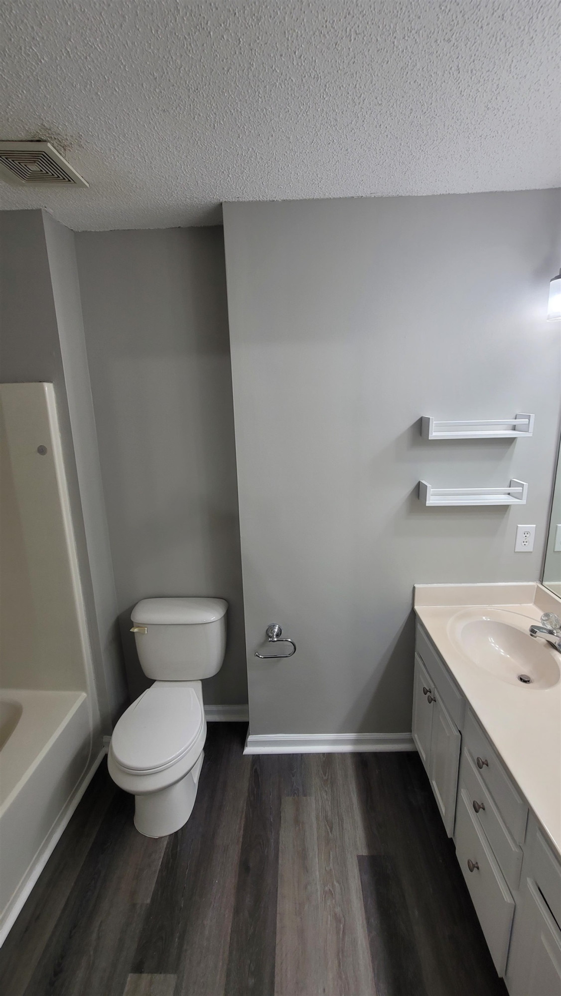3809 Axle Lane Raleigh, NC 27616 - Photo 11 of 30 a bathroom with a toilet and a sink