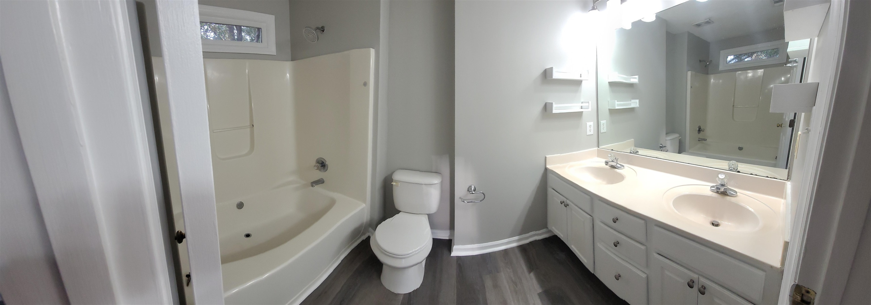 3809 Axle Lane Raleigh, NC 27616 - Photo 22 of 30 a bathroom with a granite countertop sink toilet and shower