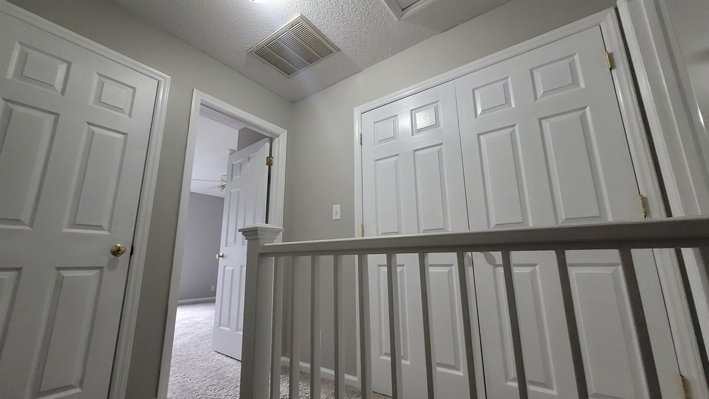 3809 Axle Lane Raleigh, NC 27616 - Photo 24 of 30 a view of a porch with wooden floor