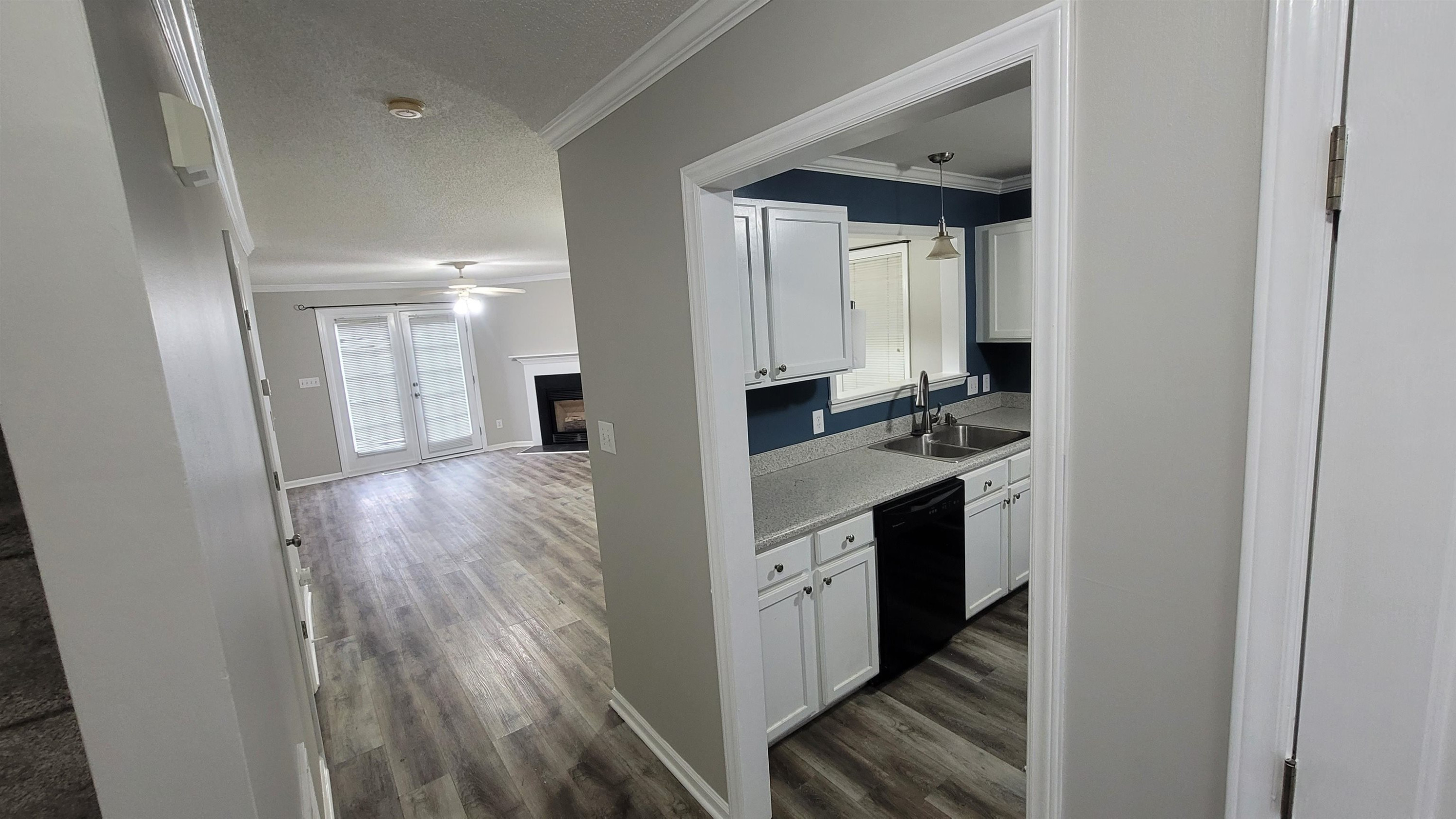 3809 Axle Lane Raleigh, NC 27616 - Photo 6 of 30 a kitchen with stainless steel appliances granite countertop a refrigerator and a sink