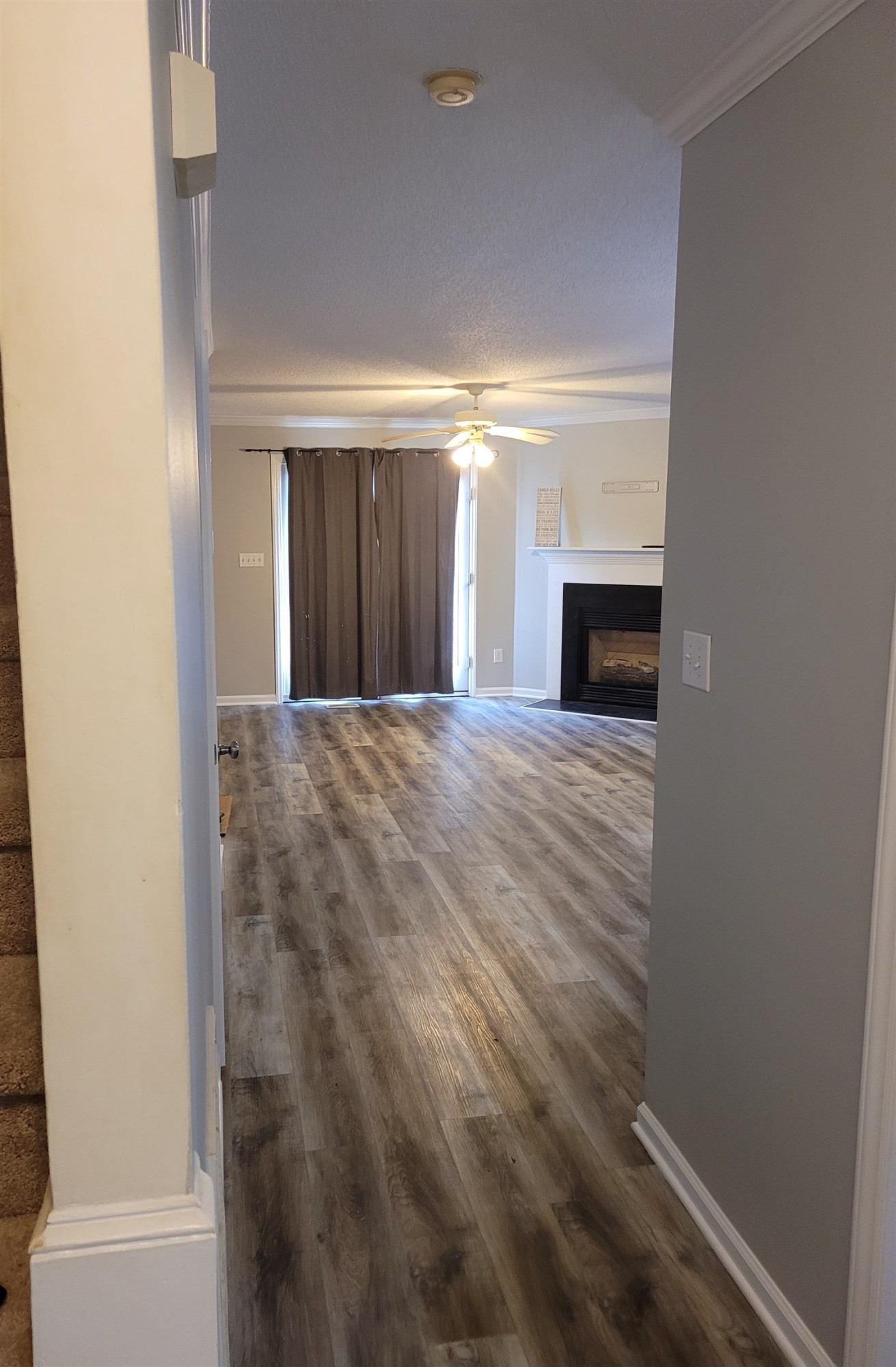 3809 Axle Lane Raleigh, NC 27616 - Photo 7 of 30 a view of a livingroom with a fireplace