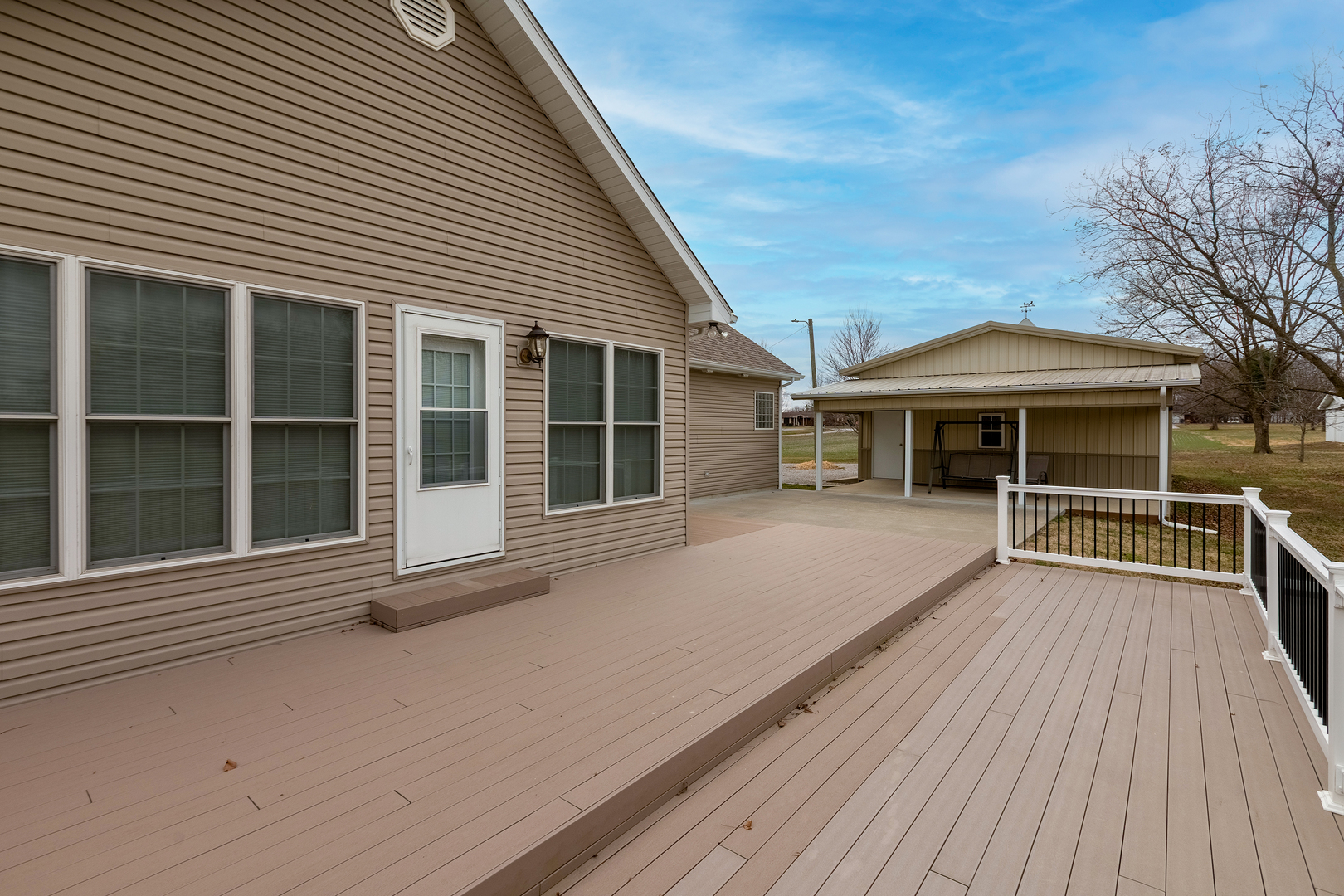 8511 Knox Road West Frankfort, IL 62896 - Photo 19 of 47 a view of a house with a large window and wooden floor