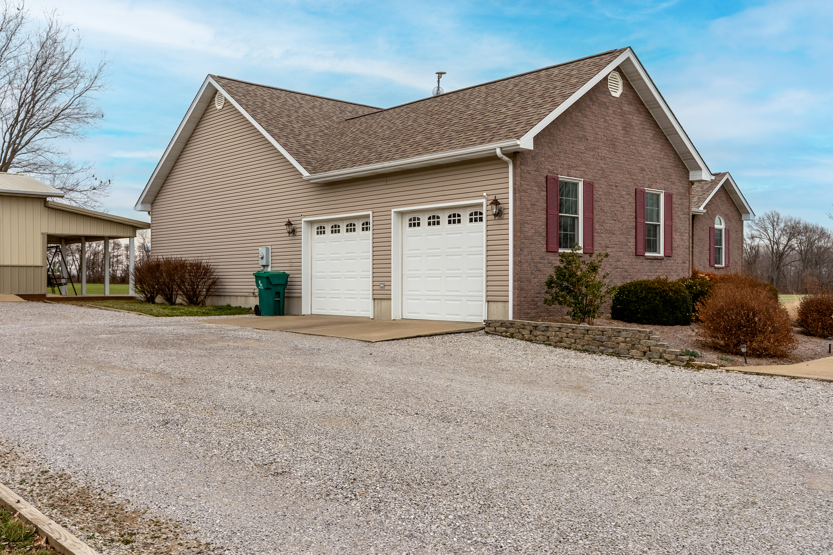 8511 Knox Road West Frankfort, IL 62896 - Photo 42 of 47 a front view of a house with a yard and garage