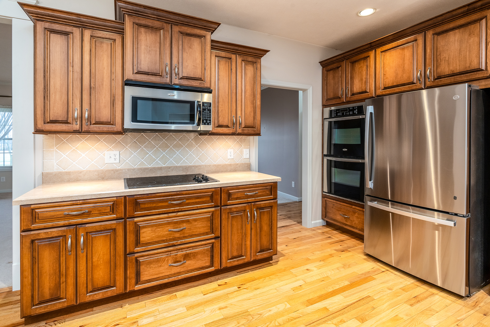 8511 Knox Road West Frankfort, IL 62896 - Photo 9 of 47 a kitchen with stainless steel appliances granite countertop a refrigerator microwave and sink