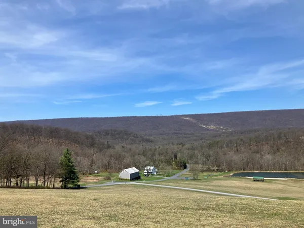 a view of mountain view with mountains in the background