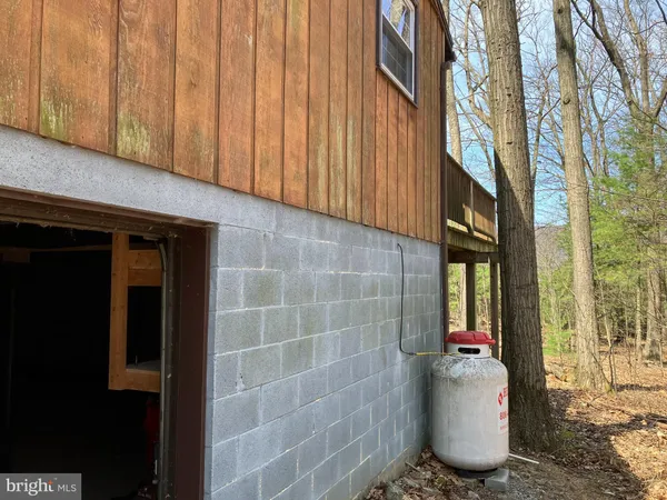 a view of a house with a small yard
