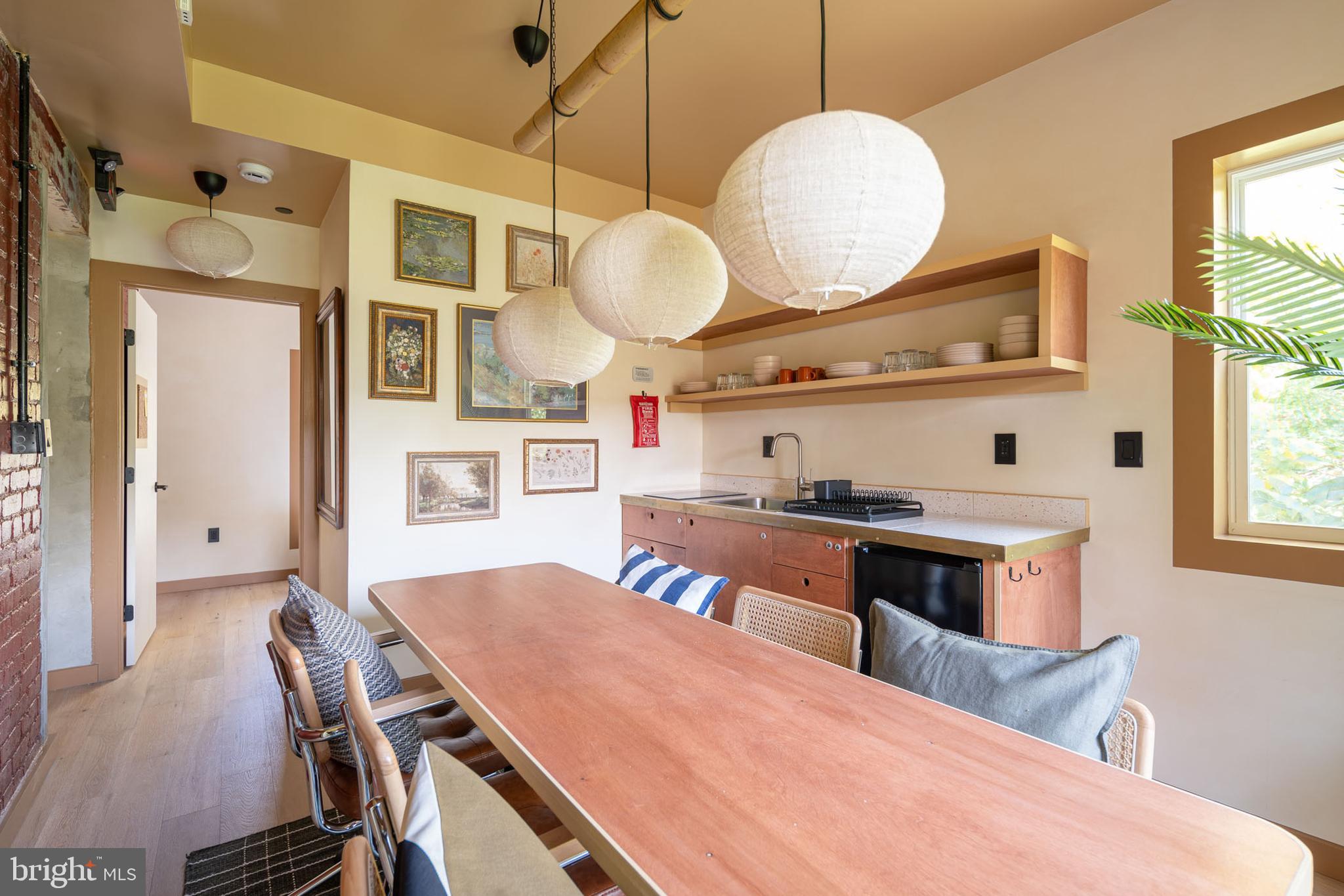 2021 4th Street Northwest Washington, DC 20001 - Photo 13 of 27 a large kitchen with a table and chairs