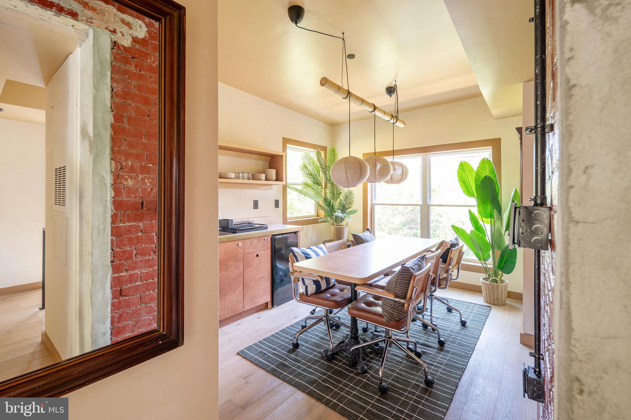2021 4th Street Northwest Washington, DC 20001 - Photo 15 of 27 a dining room with furniture and window