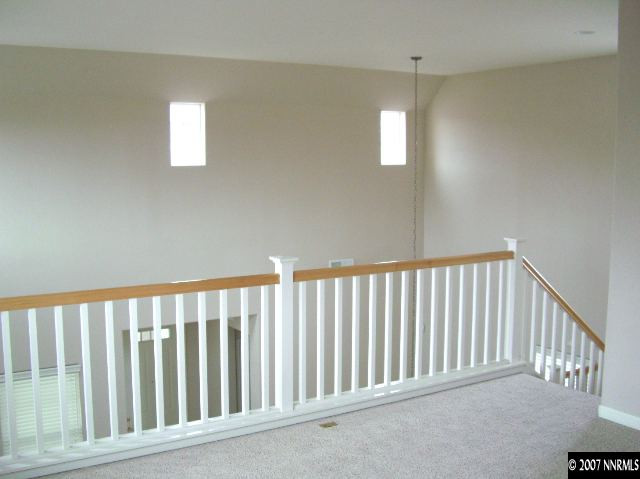 10587 Bliss Court Reno, NV 89521 - Photo 3 of 9 a view of staircase with window