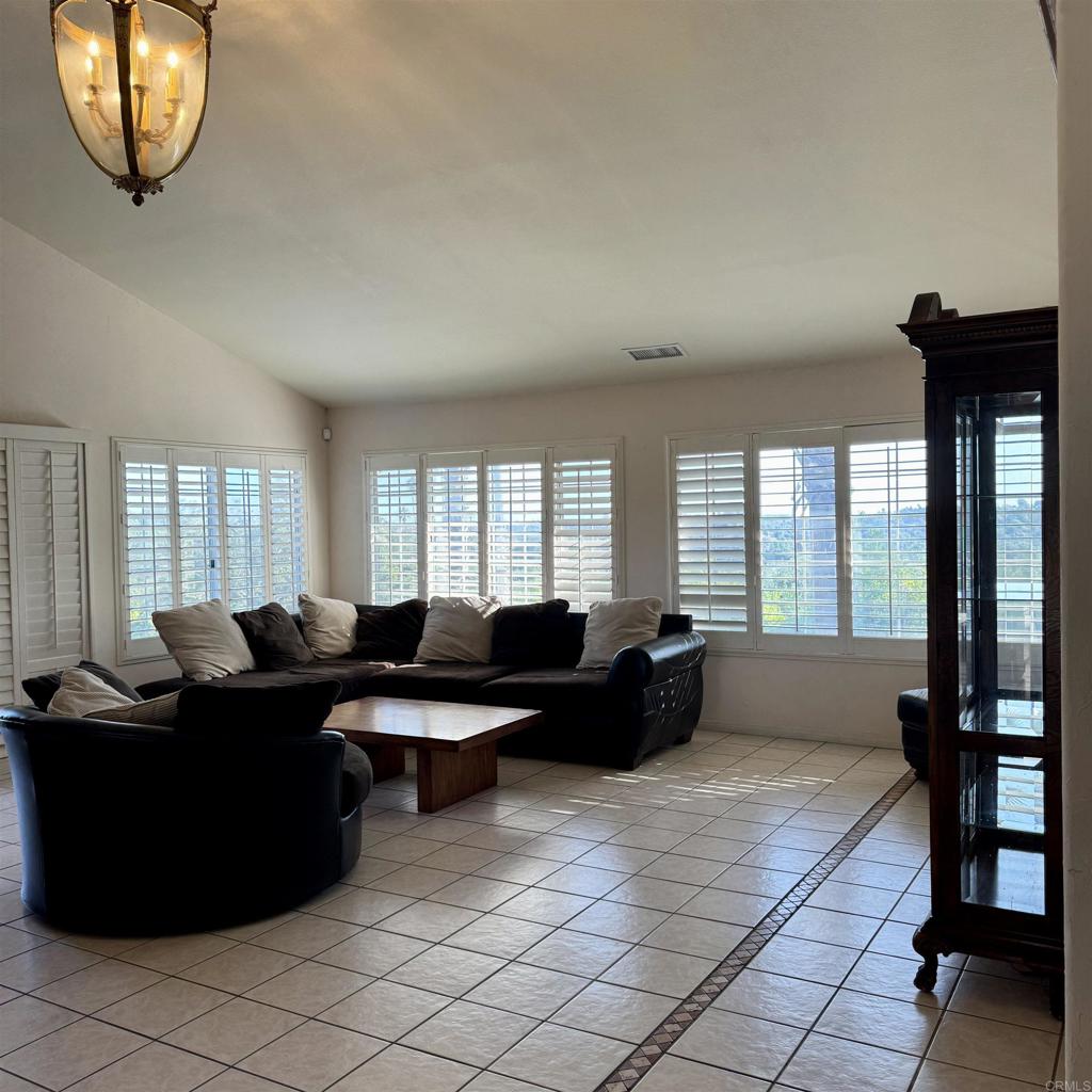 2848 Los Alisos Drive Fallbrook, CA 92028 - Photo 16 of 74 a living room with furniture and a window