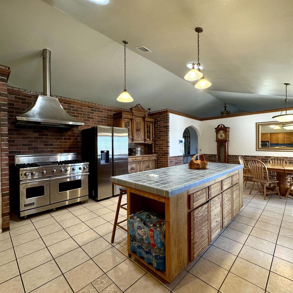 2848 Los Alisos Drive Fallbrook, CA 92028 - Photo 22 of 74 a kitchen with stainless steel appliances a stove a sink and a refrigerator