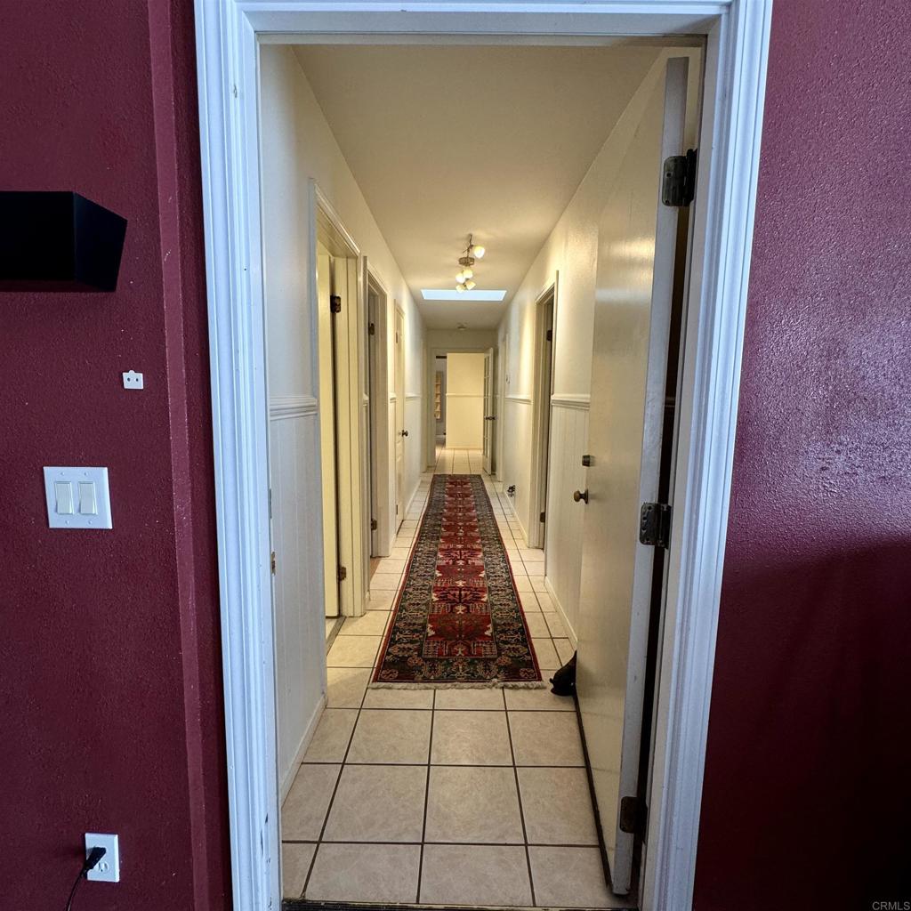 2848 Los Alisos Drive Fallbrook, CA 92028 - Photo 61 of 74 a view of a hallway with windows