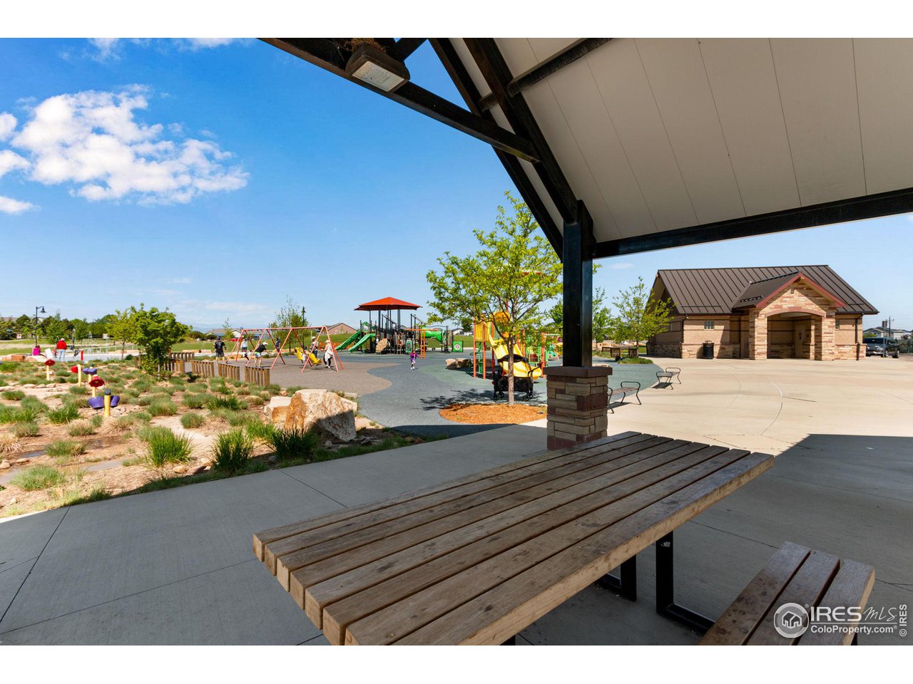 5536 Long Drive Timnath, CO 80547 - Photo 13 of 24 a view of a balcony with wooden floor