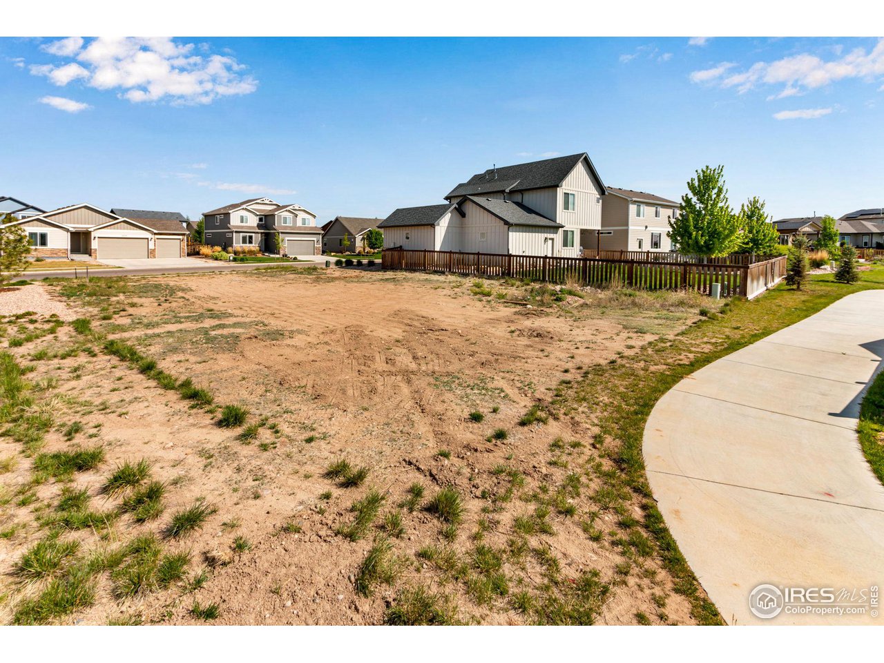 5536 Long Drive Timnath, CO 80547 - Photo 22 of 24 a view of houses with outdoor space