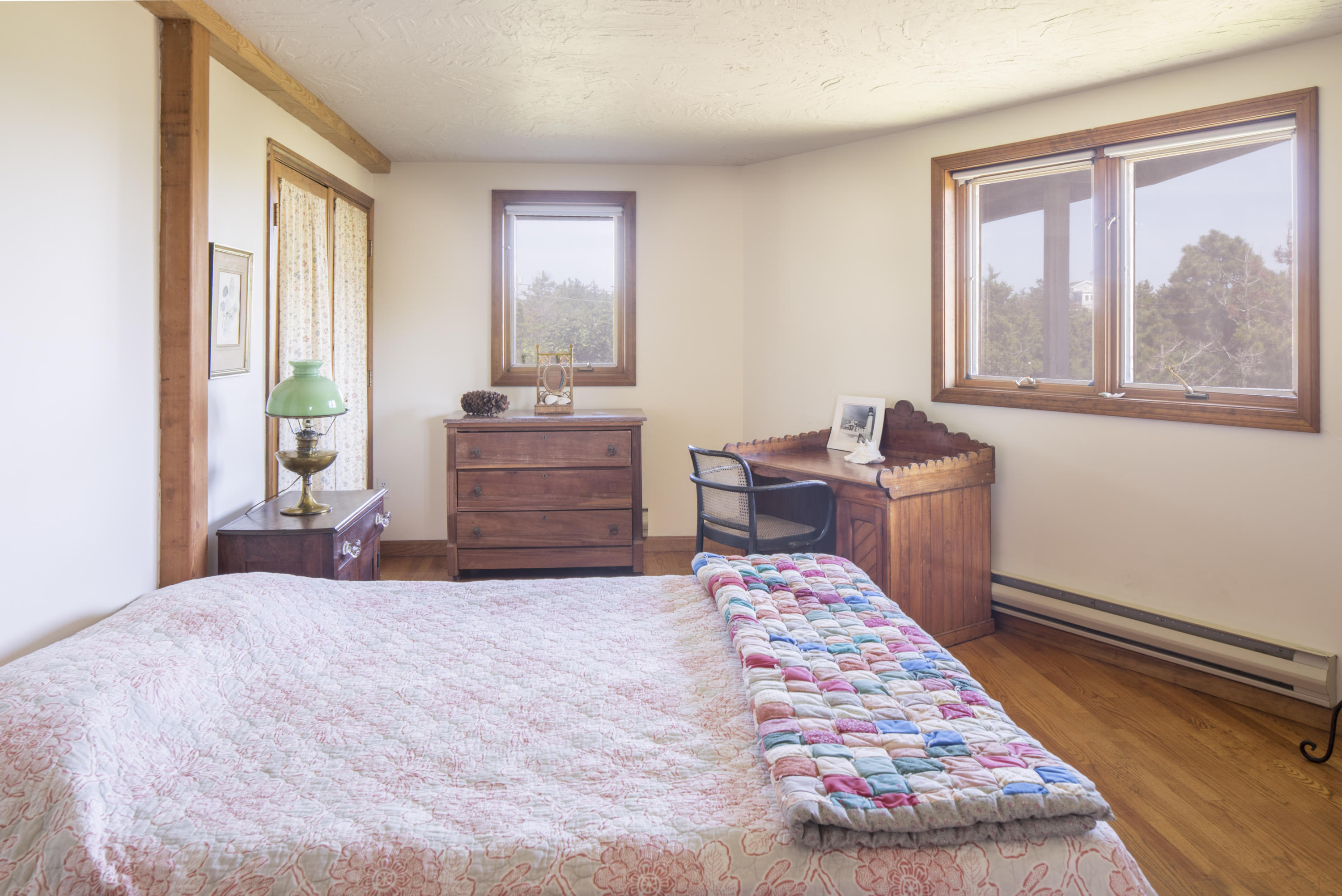 34 Bay View Road Truro, MA 02666 - Photo 12 of 14 a bedroom with a bed and wooden floor
