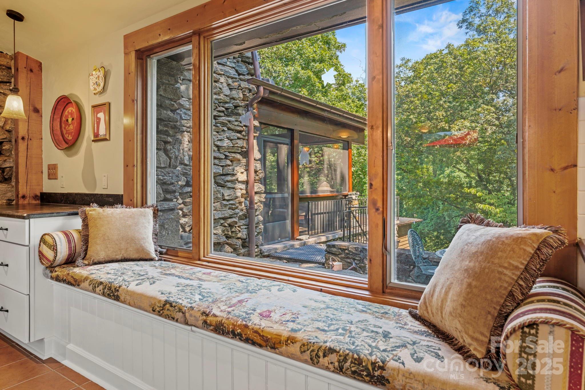 222 Stone Hedge Lane Tryon, NC 28782 - Photo 13 of 48 a living room with couch and a large window