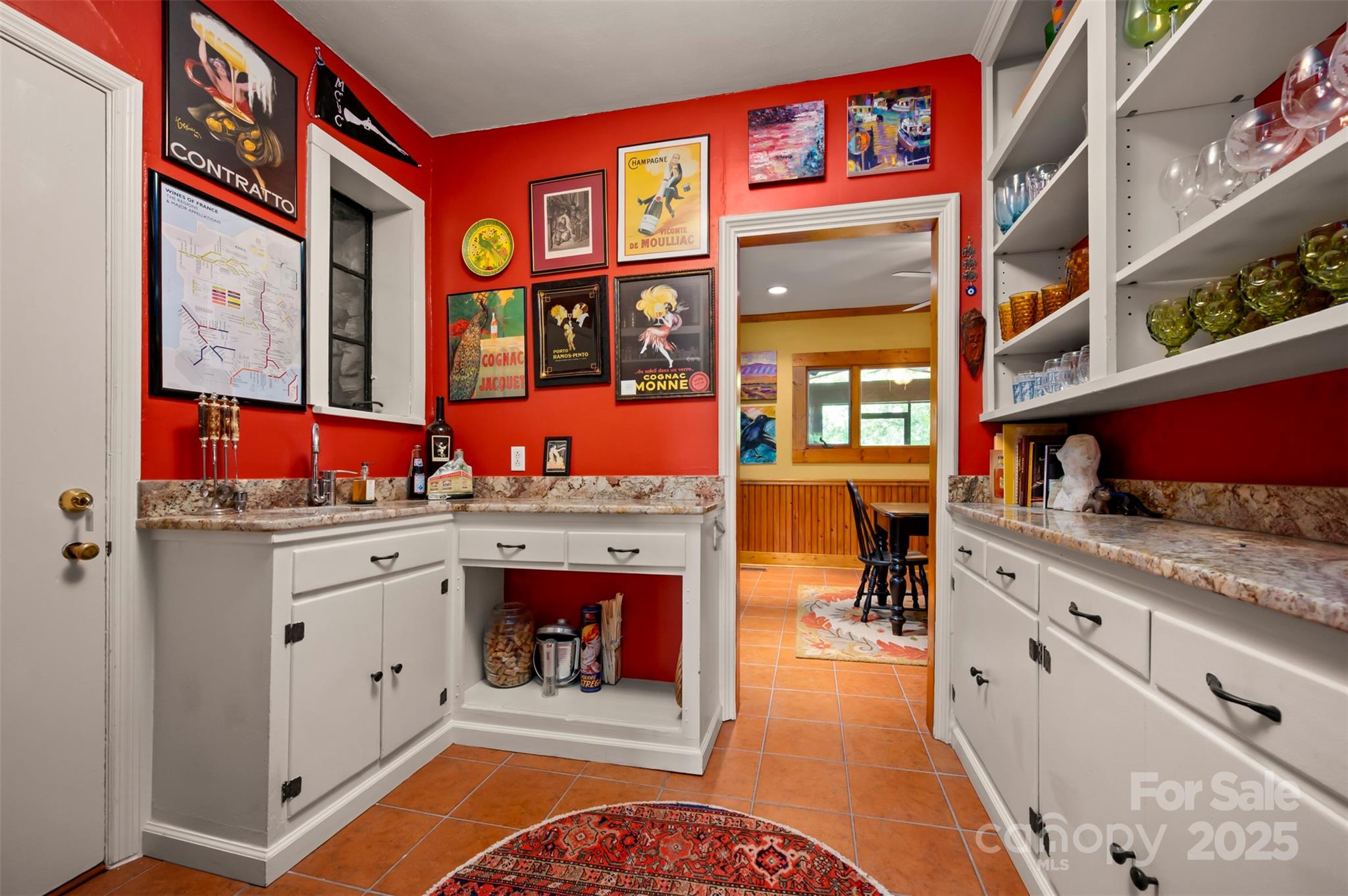 222 Stone Hedge Lane Tryon, NC 28782 - Photo 14 of 48 a kitchen with stainless steel appliances granite countertop a stove and cabinets