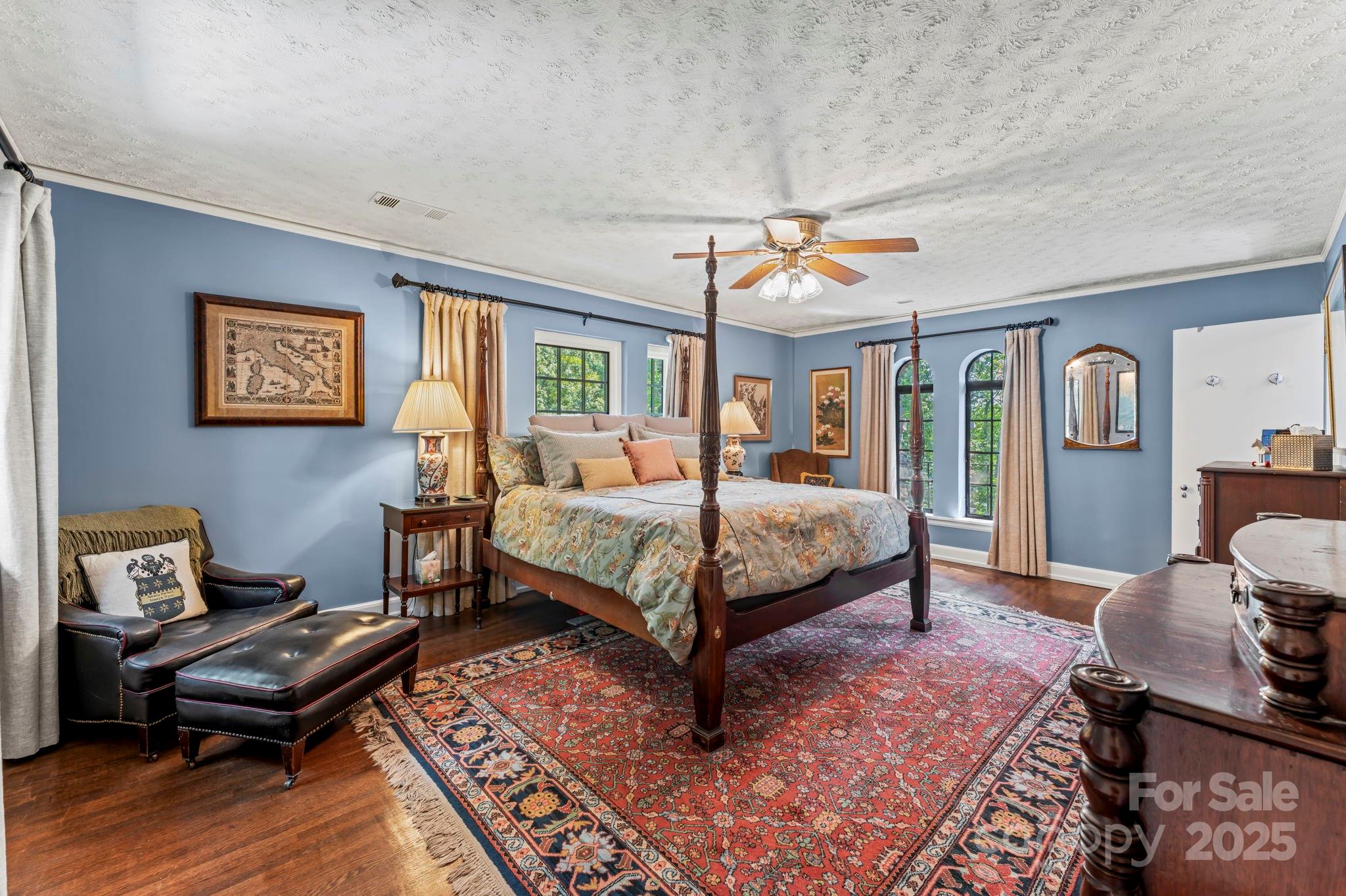 222 Stone Hedge Lane Tryon, NC 28782 - Photo 26 of 48 a bedroom with a bed wooden floor and window