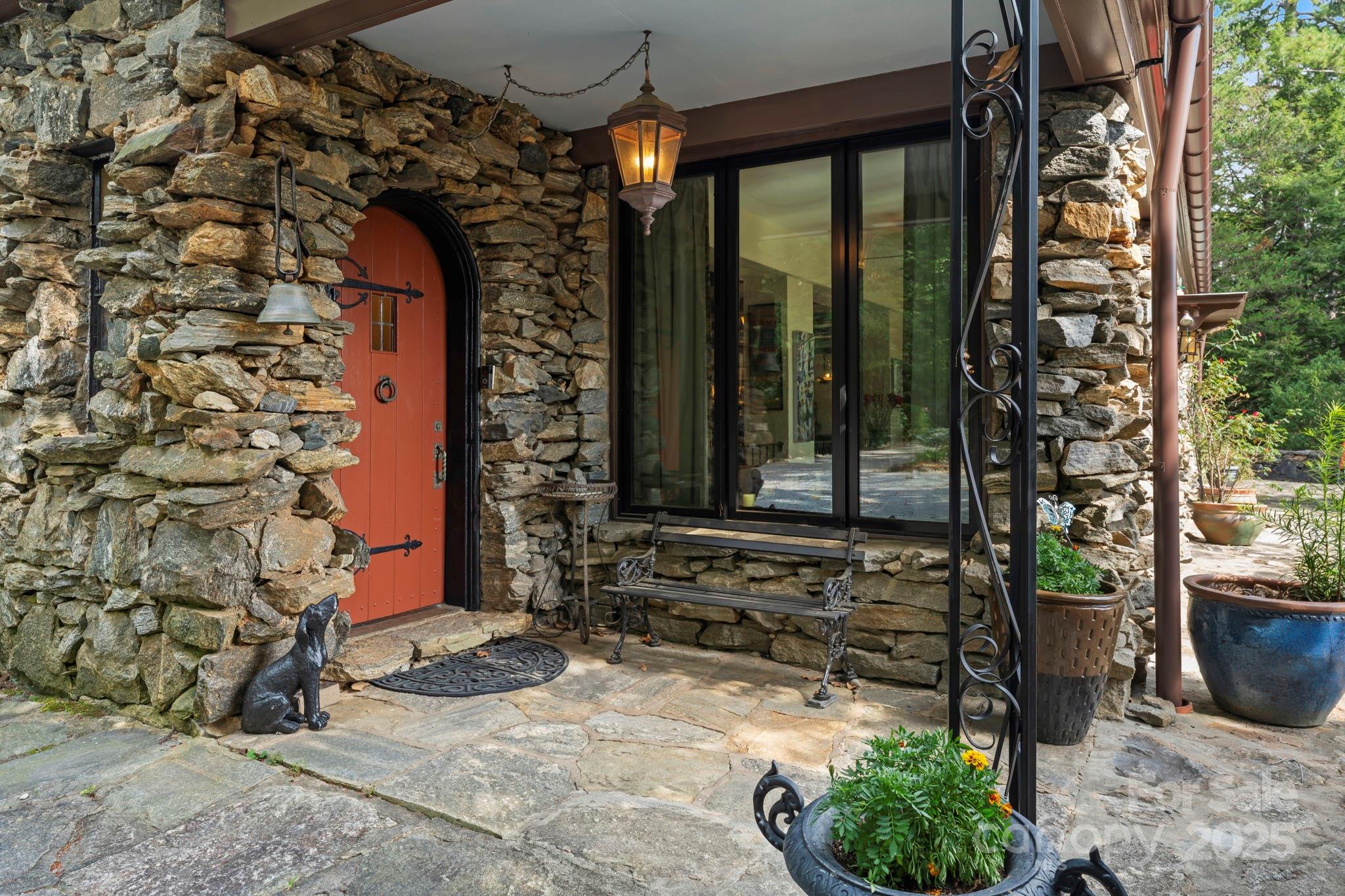 222 Stone Hedge Lane Tryon, NC 28782 - Photo 3 of 48 a front view of a house with a yard