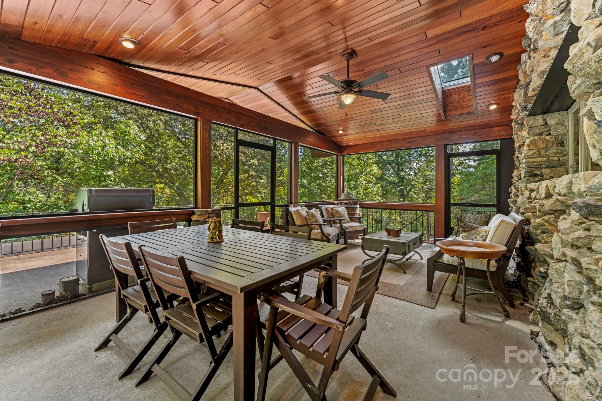 222 Stone Hedge Lane Tryon, NC 28782 - Photo 32 of 48 a view of an outside dining space with furniture window and outside view
