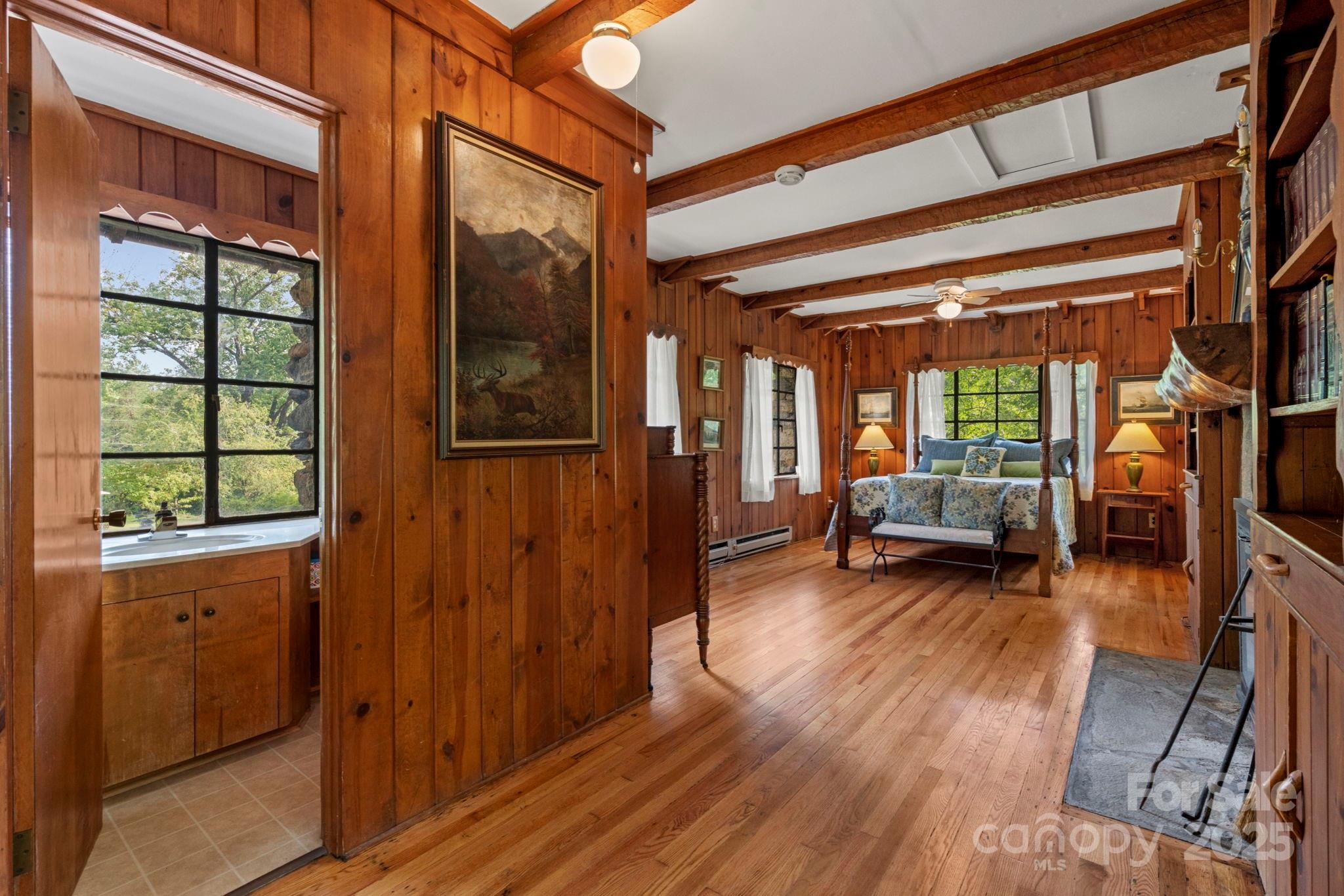 222 Stone Hedge Lane Tryon, NC 28782 - Photo 44 of 48 a living room with furniture and a wooden floor