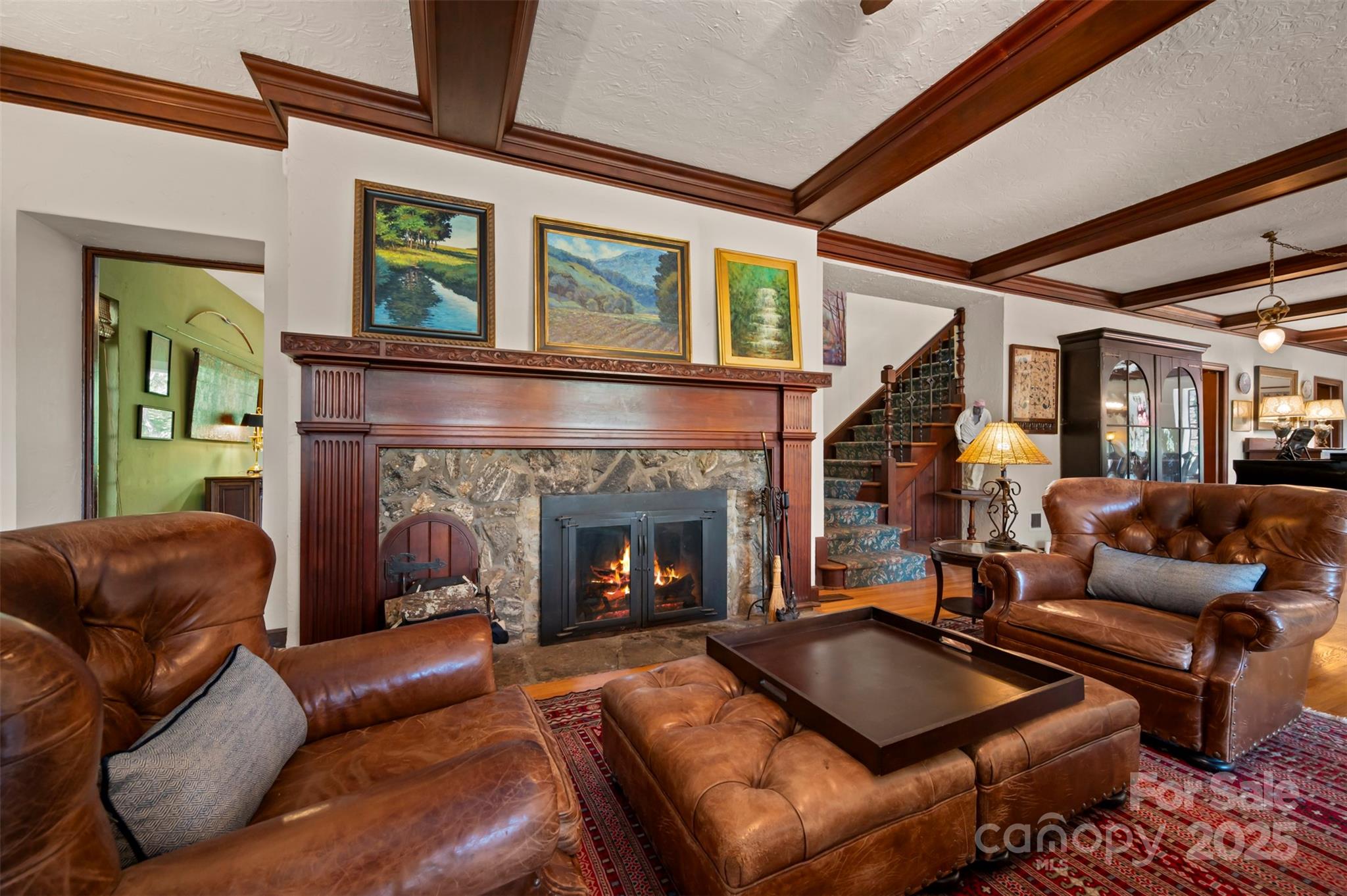 222 Stone Hedge Lane Tryon, NC 28782 - Photo 5 of 48 a living room with furniture and a fireplace