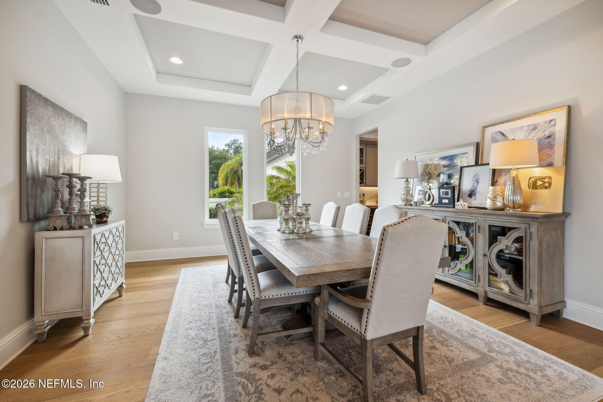5275 Bentpine Cove Road Jacksonville, FL 32224 - Photo 13 of 95 a view of a dining room with furniture window and wooden floor