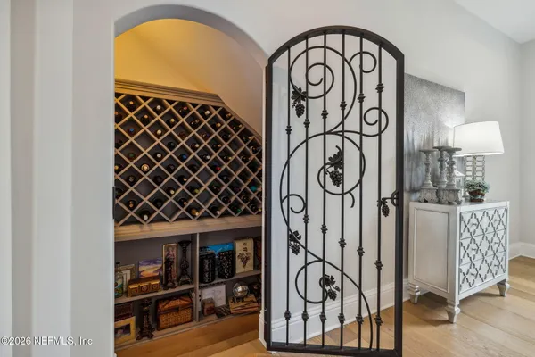 a kitchen with stainless steel appliances granite countertop a sink a stove and cabinets