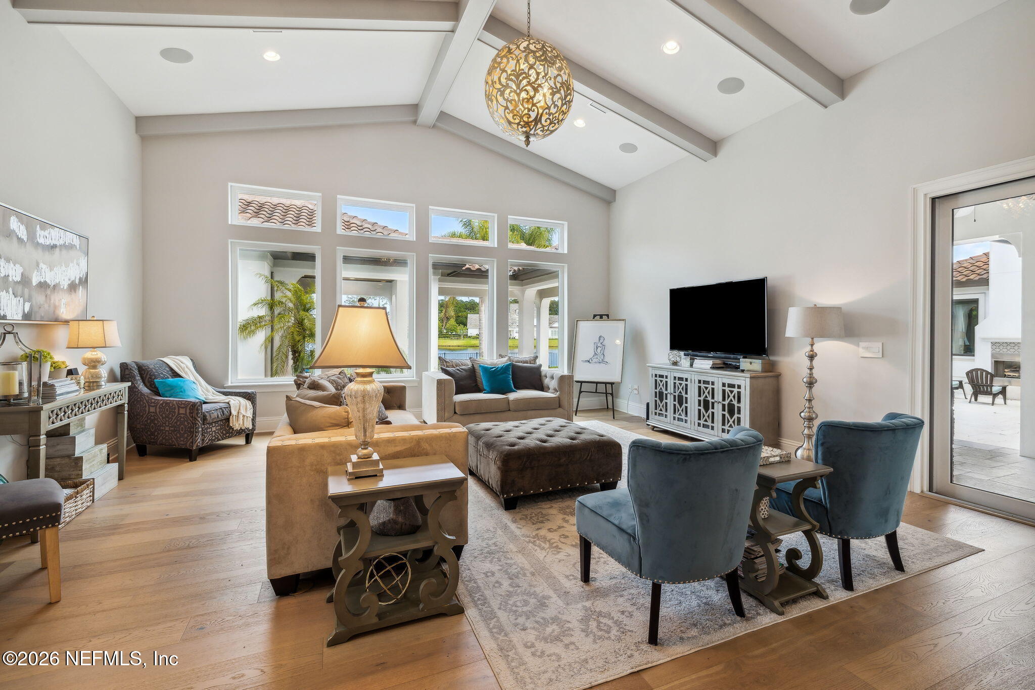 5275 Bentpine Cove Road Jacksonville, FL 32224 - Photo 17 of 95 a view of a livingroom with furniture and a flat screen tv