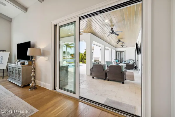 a living room with furniture and a window