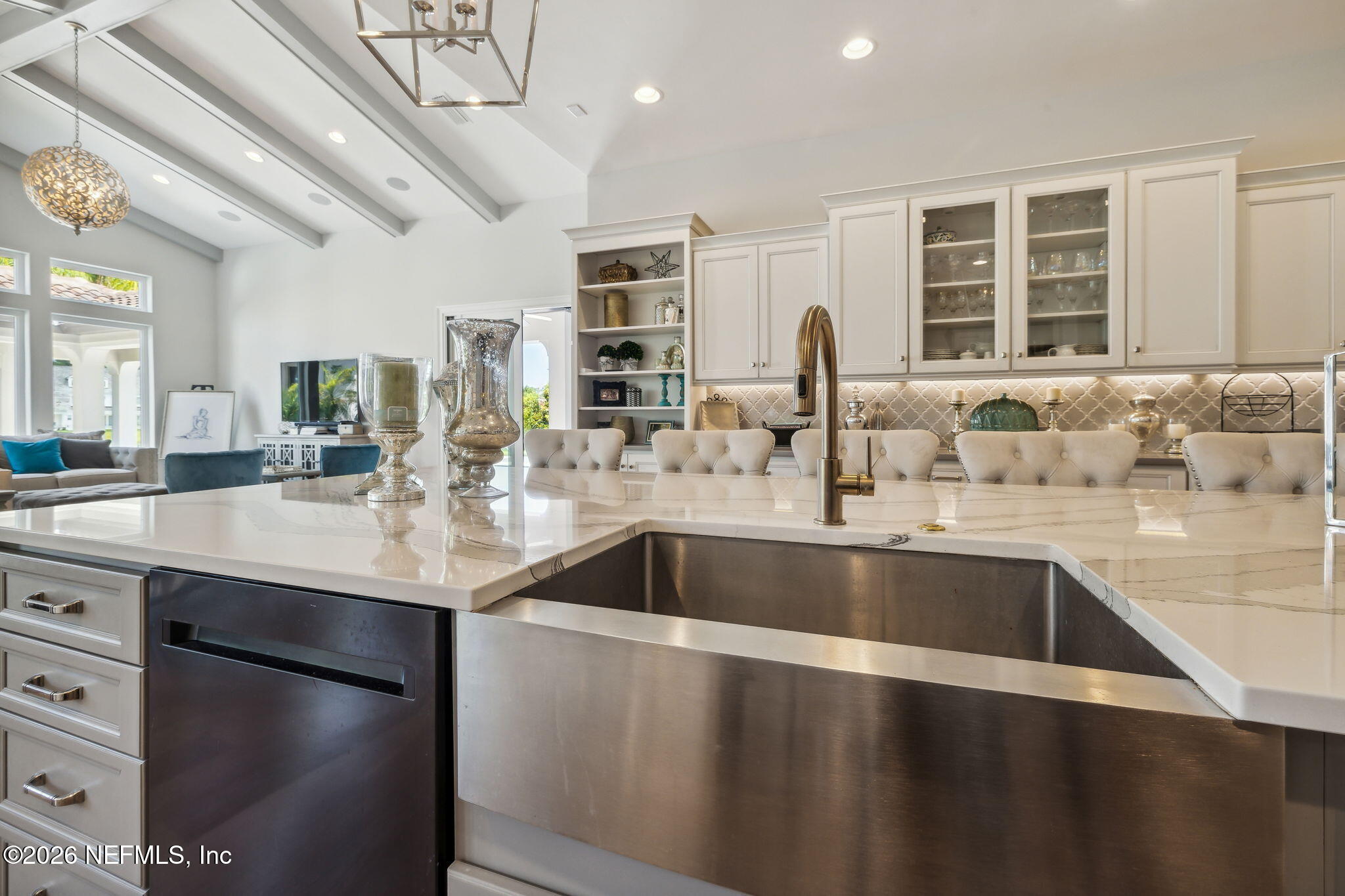 5275 Bentpine Cove Road Jacksonville, FL 32224 - Photo 26 of 95 a view with kitchen island a sink appliances and a counter top space