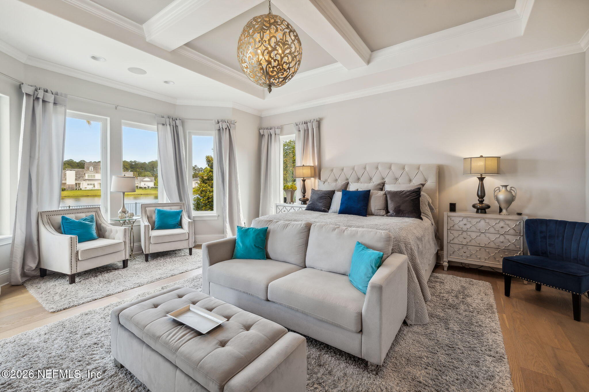 5275 Bentpine Cove Road Jacksonville, FL 32224 - Photo 32 of 95 a living room with furniture and a large window