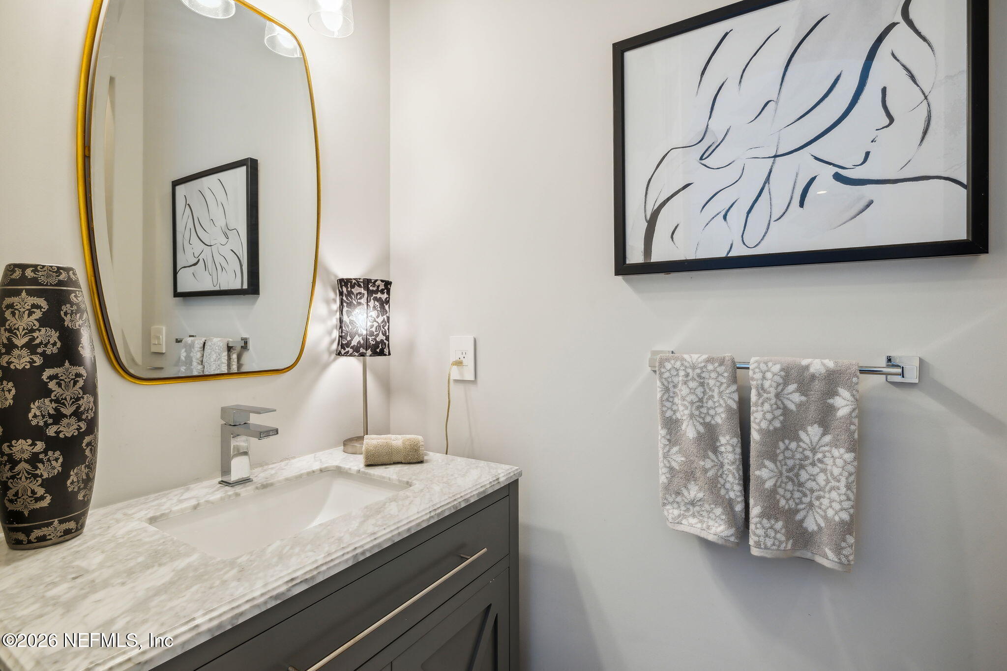 5275 Bentpine Cove Road Jacksonville, FL 32224 - Photo 37 of 95 a bathroom with a granite countertop sink and a mirror