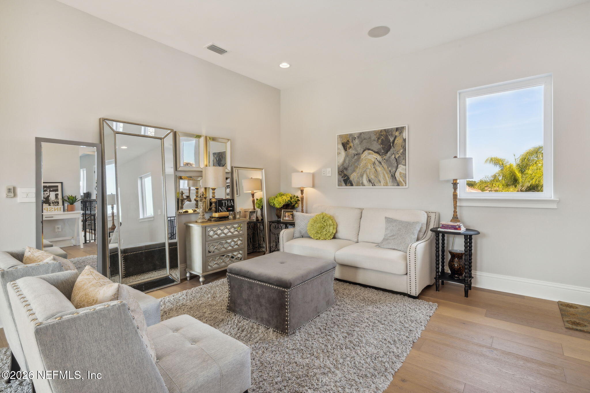 5275 Bentpine Cove Road Jacksonville, FL 32224 - Photo 47 of 95 a living room with furniture and a fireplace